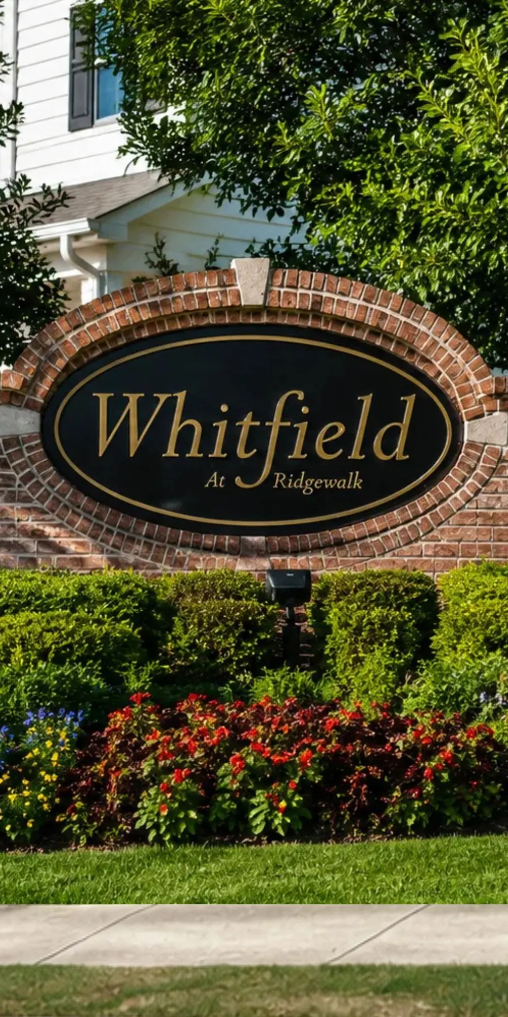 Brick monument entrance sign for Whitfield at Ridgewalk
