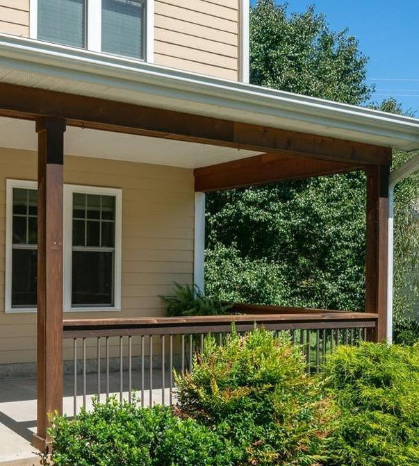 Side deck with wrapped posts and railing